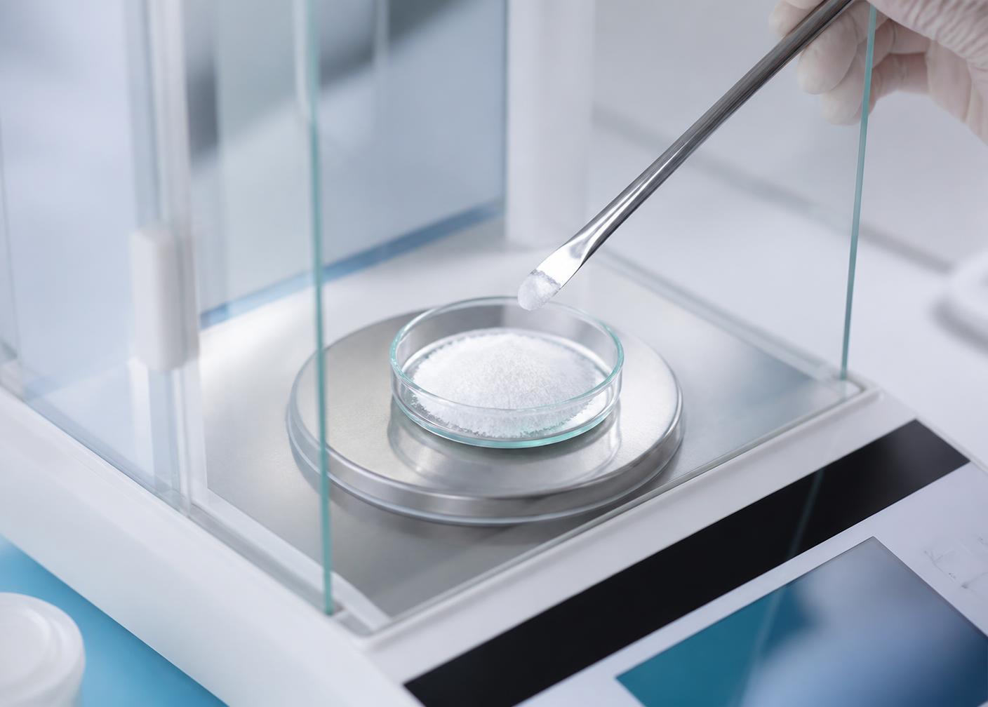 Compounding ingredients weighed on a precision balance